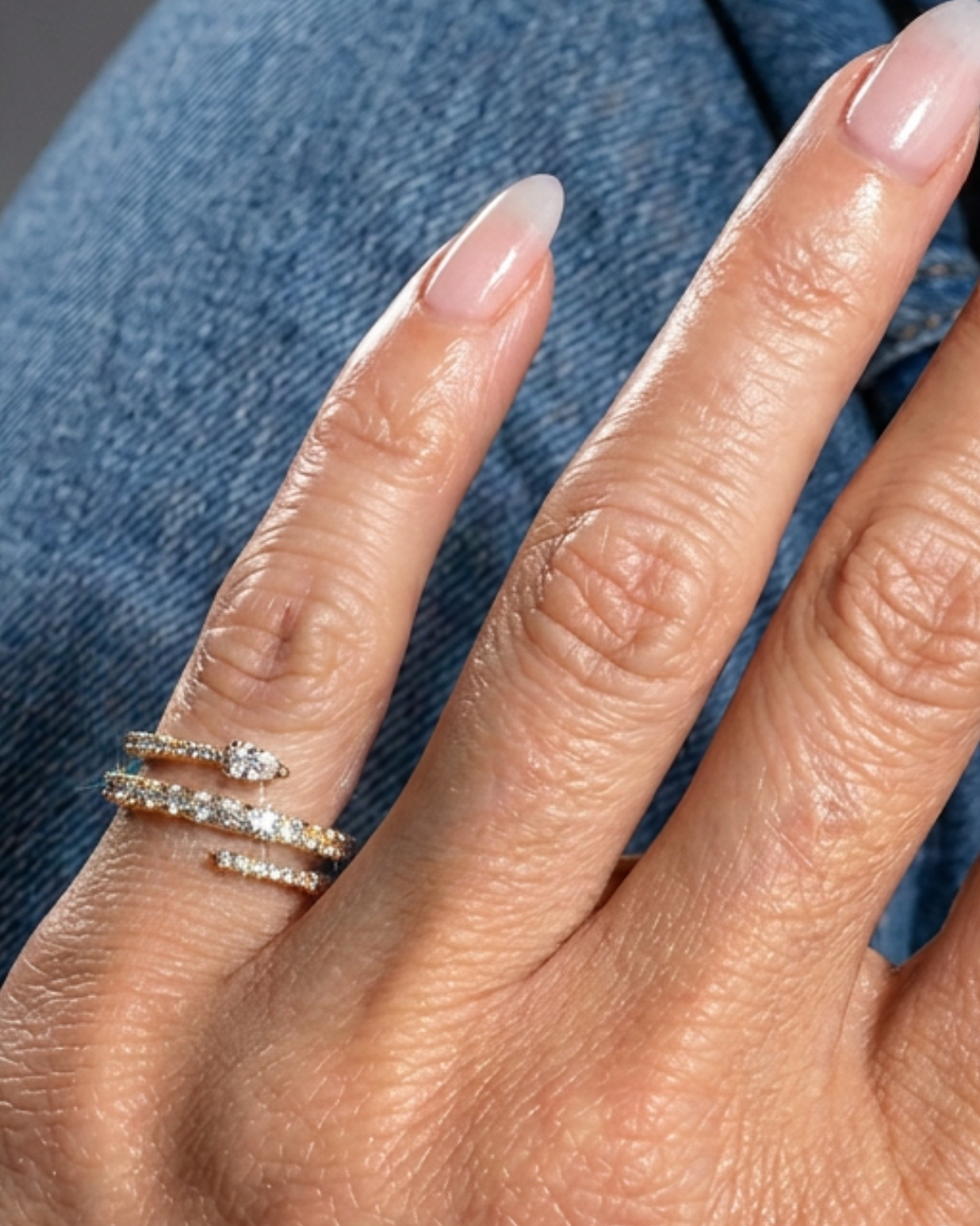 Billie east-west pear coil pinky ring
