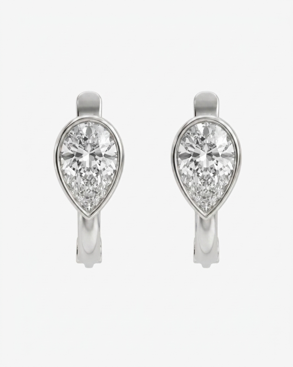 Mostly Fine Pia upside down bezel pear cut moissanite huggies in silver