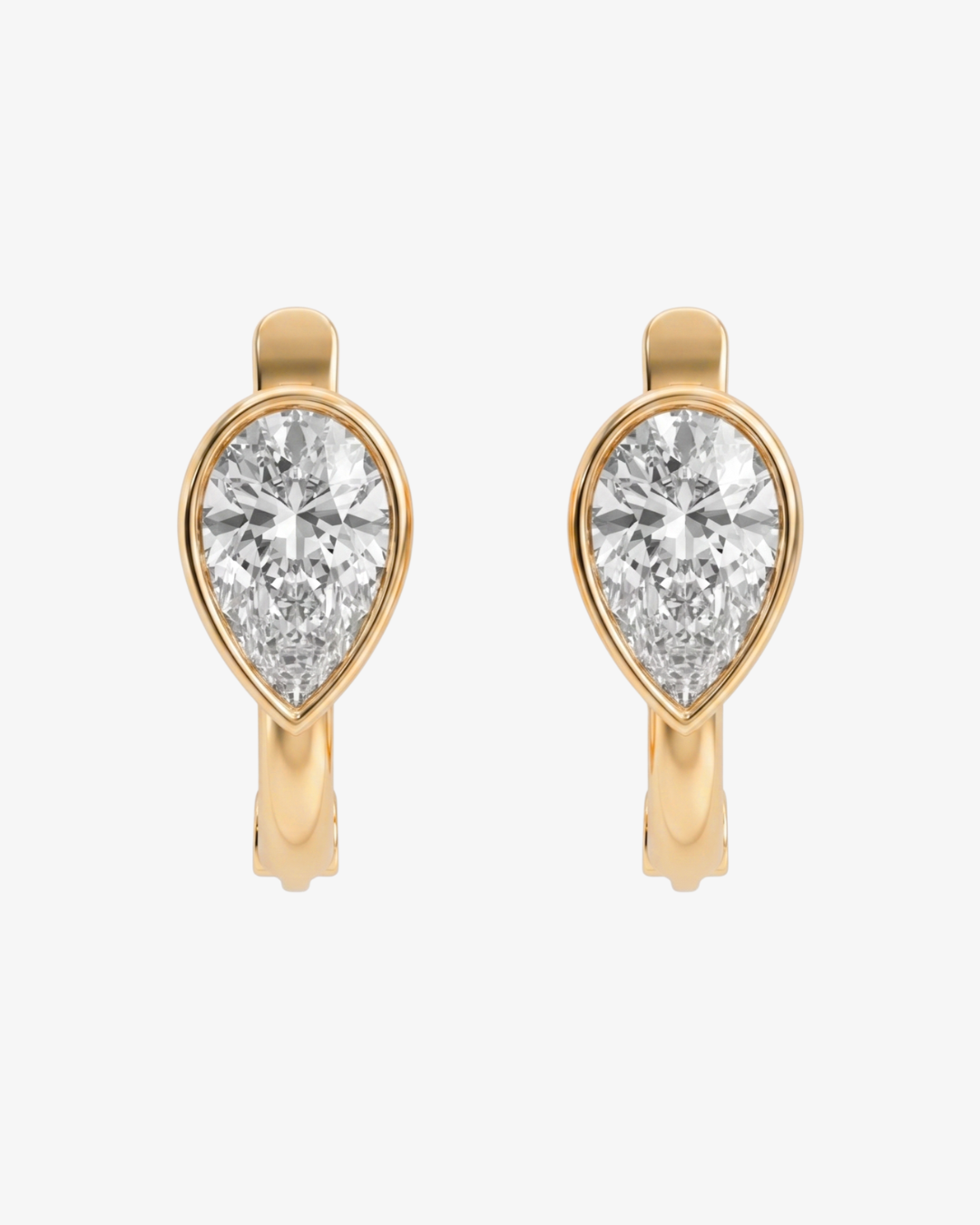 Mostly Fine Pia upside down bezel pear cut moissanite huggies in 18K vermeil