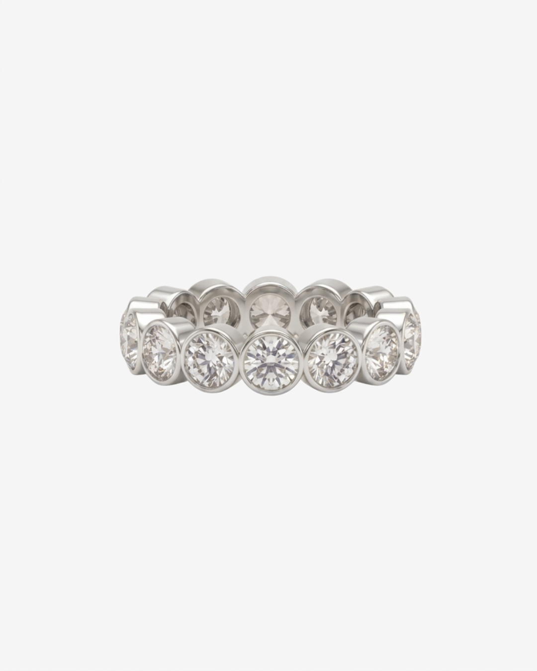 Mostly Fine Sable 4mm round moissanite eternity band ring in silver on white background